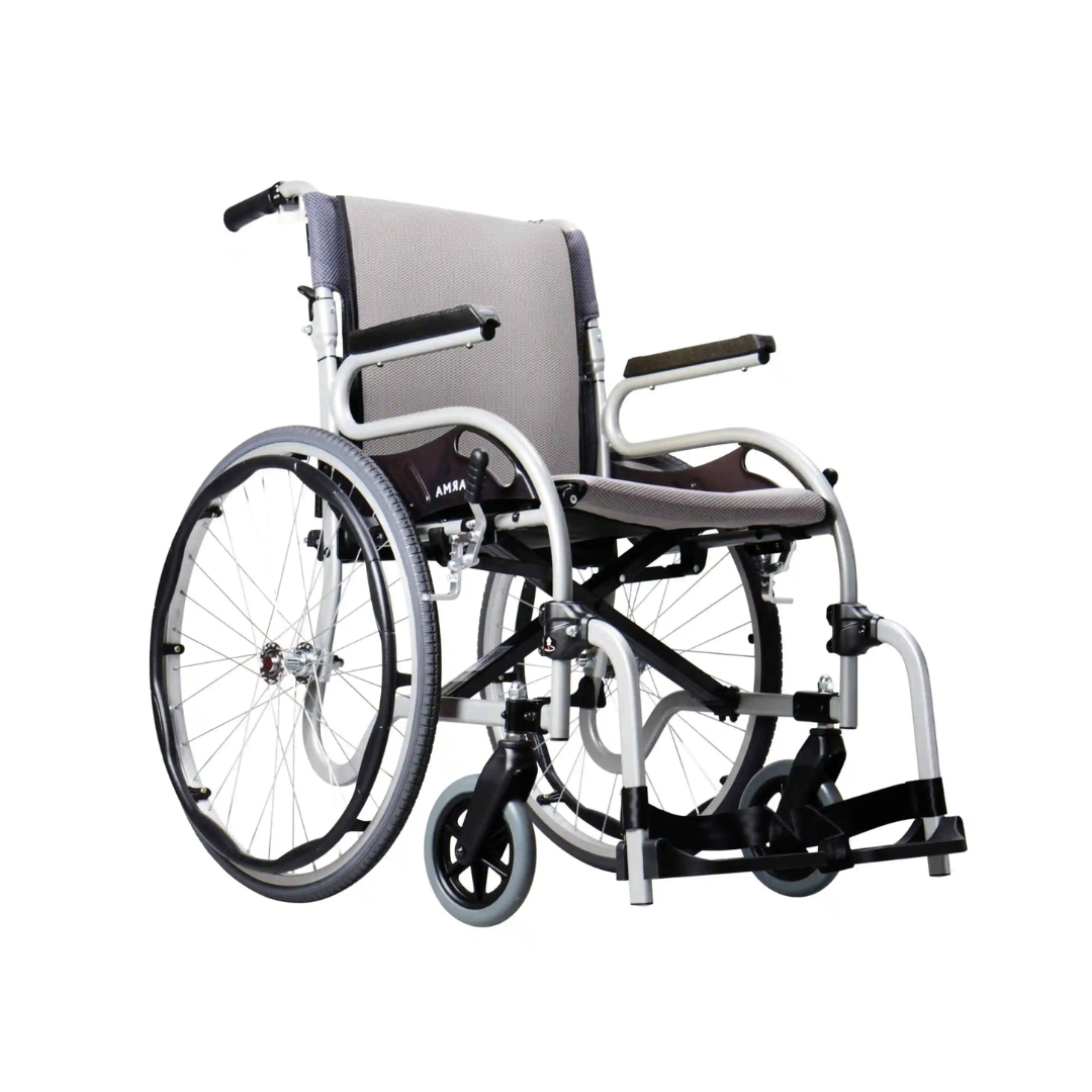 The Karman Healthcare STAR 2 Lightweight Folding Wheelchair features large rear wheels, small front casters, padded arms, a fabric seat and backrest, footrests, and a sleek silver frame with black and gray accents for comfort and style.